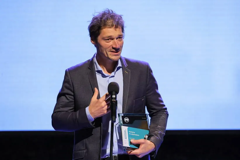 Zwycięzca w kategorii TEKST Bartek Sabela za materiał Kraina obiecana. Fot. PAP/Paweł Supernak